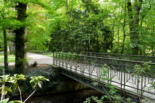 Brücke mit Liebesschlössern im Stadtpark in Gütersloh, NRW photo