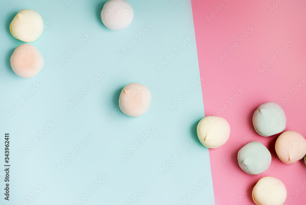 Homemade sweet colored meringue on white background. Dessert. Homemade sweet colored meringue on white background. Dessert.