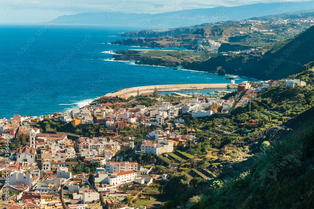 Farm village by the coast of Tenerife with blue sea water Farm village by the coast of Tenerife with blue sea water