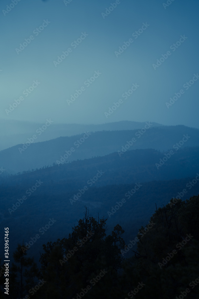 Obraz premium Sea of Mountains, mountain range silhouette 