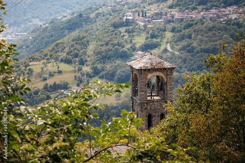 Wallpaper Mural stone church in the mountains of lake como italy with bells Torontodigital.ca