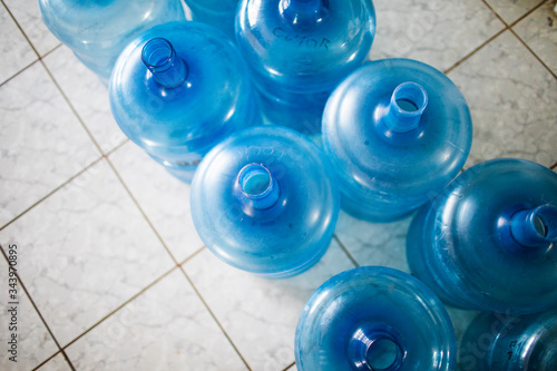 Clean drinking water jugs ready to be filled.