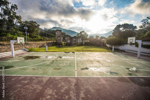 Wallpaper Mural Basketball sports court adjacent to Colonia Candelaria in Antigua. Torontodigital.ca