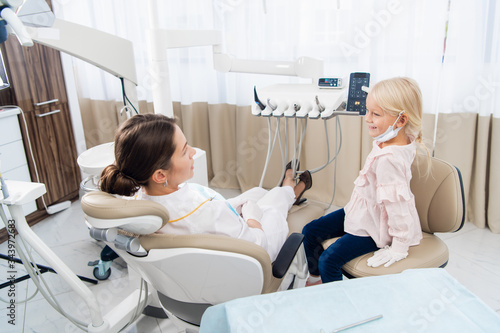 Kids at hospital, Little doctors, playing a dentist