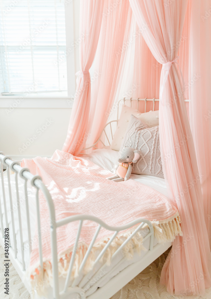 Pink Little girls bed with stuffed animal Pink Little girls bed with stuffed animal