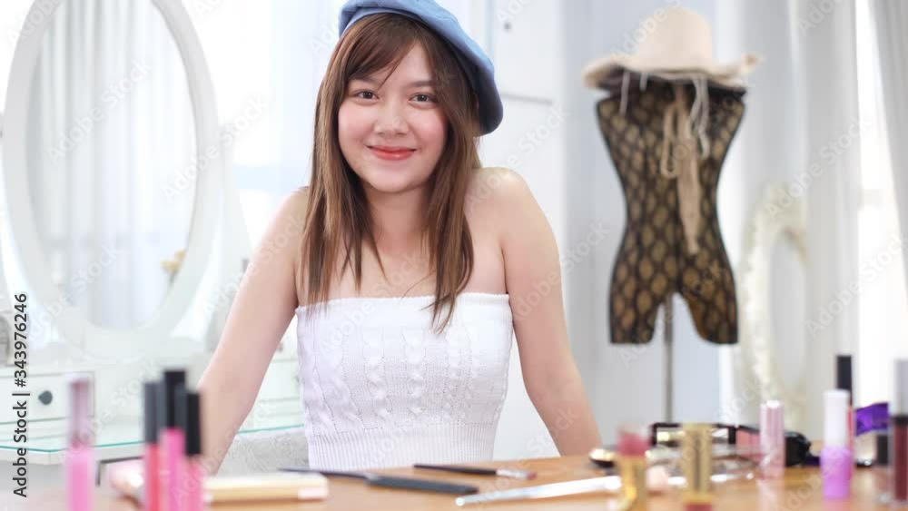 Makeup vlogger influencer creating cosmetic product explainer video. personal make up vlog.Young asian woman influencer beauty fashion blogger. Makeup vlogger influencer creating cosmetic product explainer video. personal make up vlog.Young asian woman influencer beauty fashion blogger.