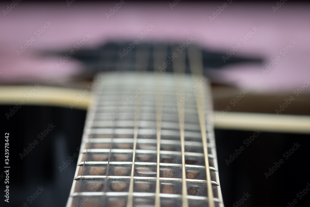 Fototapeta premium Close-up of black acoustic guitar