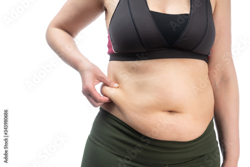 Close-up of an obese woman on her stomach. Conceptual image. Front view. Close-up, Isolated on a white background.