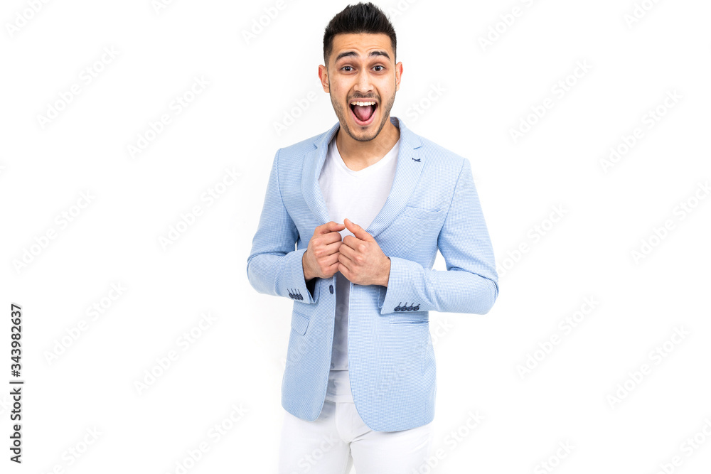 successful businessman in a blue jacket posing on a white background with copy space successful businessman in a blue jacket posing on a white background with copy space