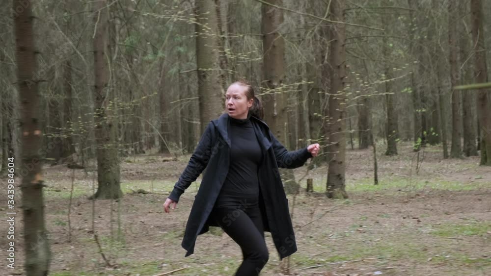 Lost woman walking in forest calls for help. Lost woman walking in forest calls for help.