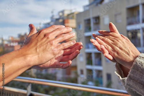 hands clapping mother and son