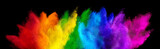 colorful rainbow holi paint color powder explosion isolated dark black wide panorama background. peace rgb beautiful party concept