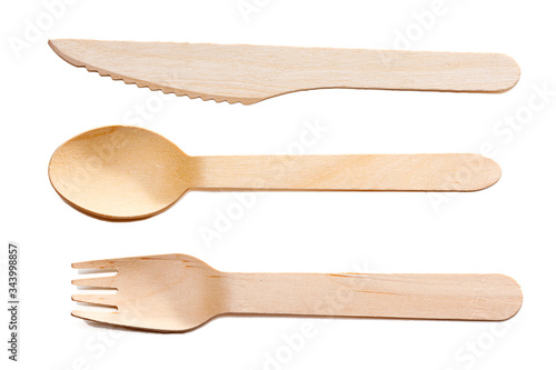 Wooden cutlery, disposable fork, spoon and knife isolated on white background