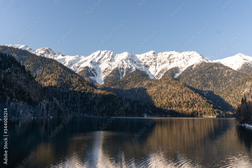 An alpine lake Ritsa in spring. Abkhazia.