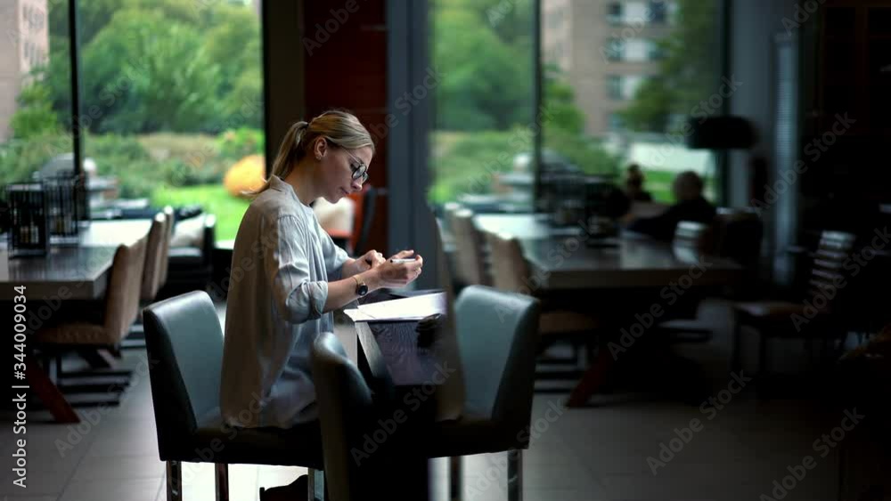 Caucasian woman working with financial documents during remote job indoors, intelligent millennial employee checking information from report making notes of fresh ideas
Caucasian woman working with financial documents during remote job indoors, intelligent millennial employee checking information from report making notes of fresh ideas