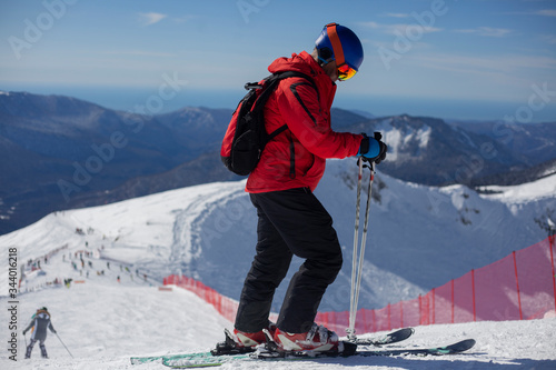 A skier on a slope rides.