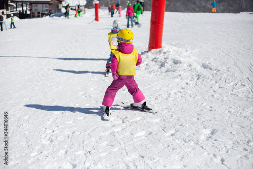 Child skiing on a hillside