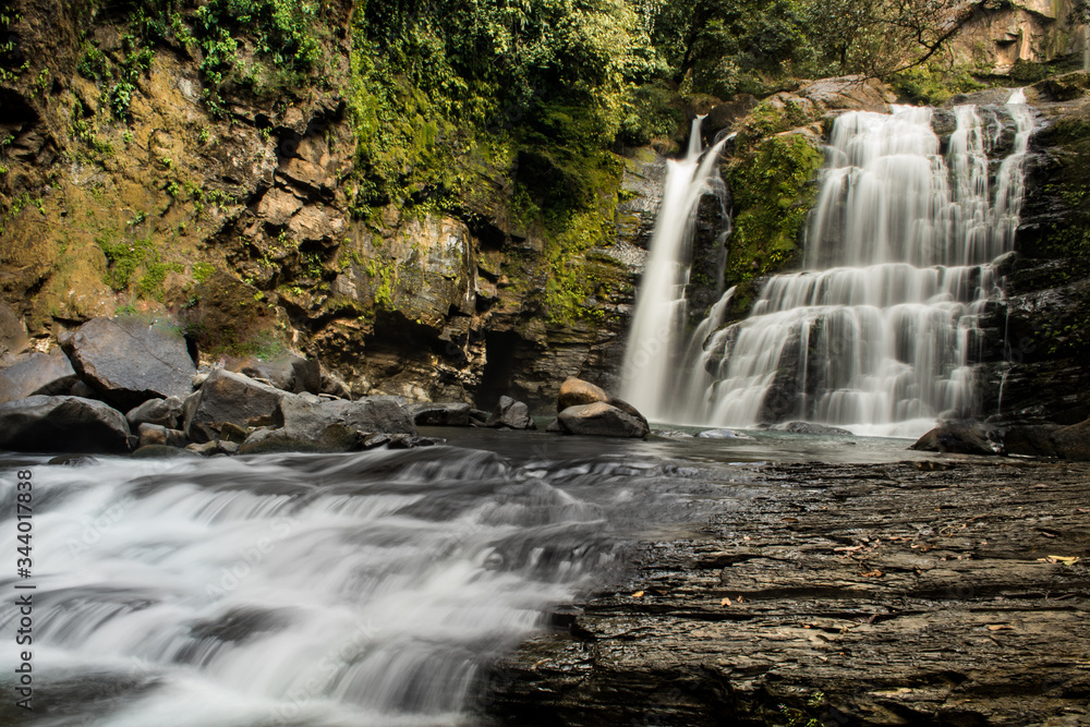 Fototapeta premium Waterfall in the forest. Nauyaca Waterfall, Costa Rica.