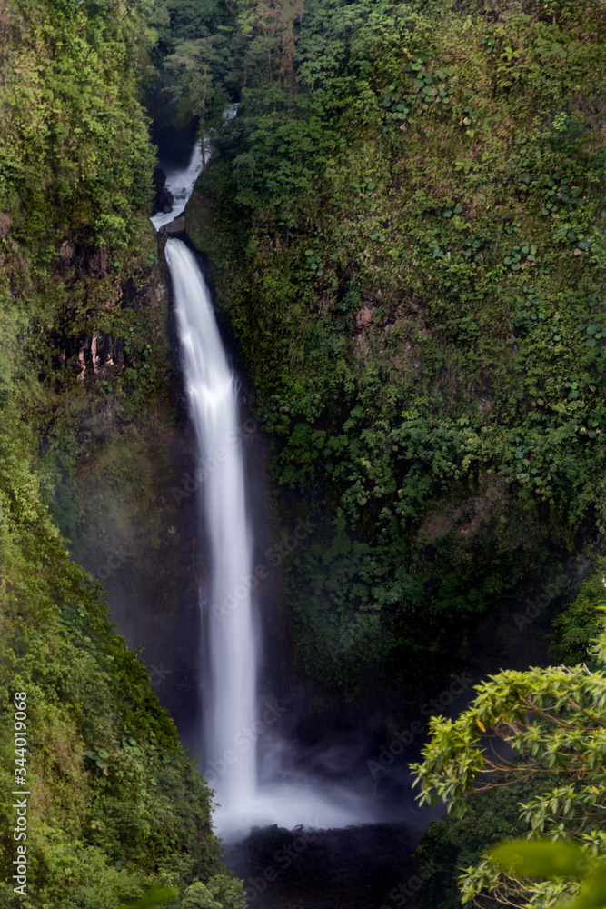 Fototapeta premium Waterfall in the forest, Costa Rica