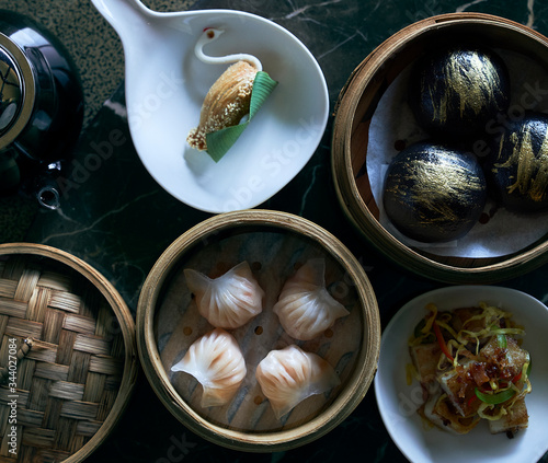 Chinese brunch of dim sum dumplings with tea
