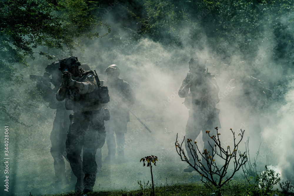 Military Historical reconstruction soldiers fighting during. US Army soldier soldiers in a cloud of smoke. Military Historical reconstruction soldiers fighting during. US Army soldier soldiers in a cloud of smoke.