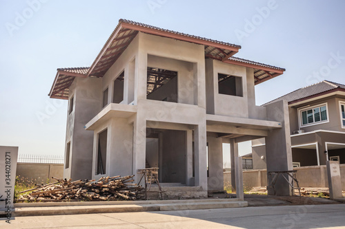 New residential house contemporary style building in progress at construction site