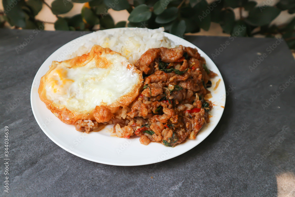 sunny side up egg and stir fried park with chilli paste sunny side up egg and stir fried park with chilli paste