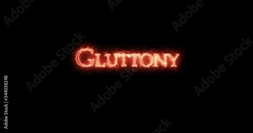 Gluttony written with fire. Loop photo