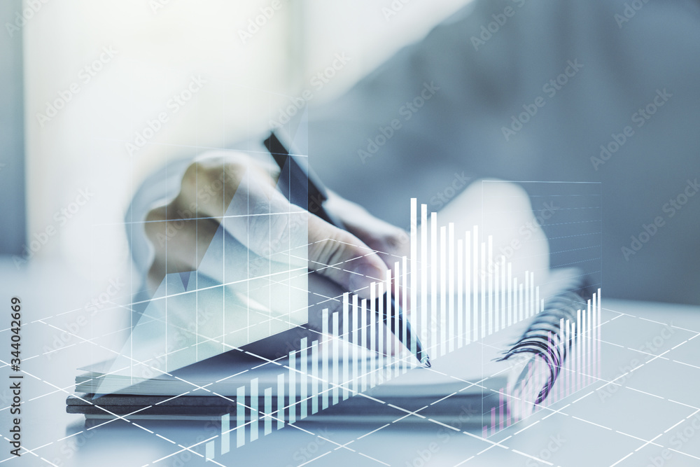 Abstract creative financial graph with hand writing in diary on background, financial and trading concept. Multiexposure Abstract creative financial graph with hand writing in diary on background, financial and trading concept. Multiexposure