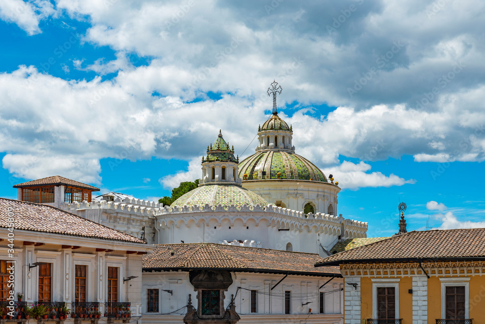 The domes of the Jesuit Compania de Jesus church and colonial style facades in the historic city center of Quito, Ecuador.