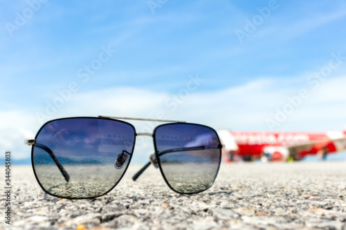 Close up sunglasses at airport