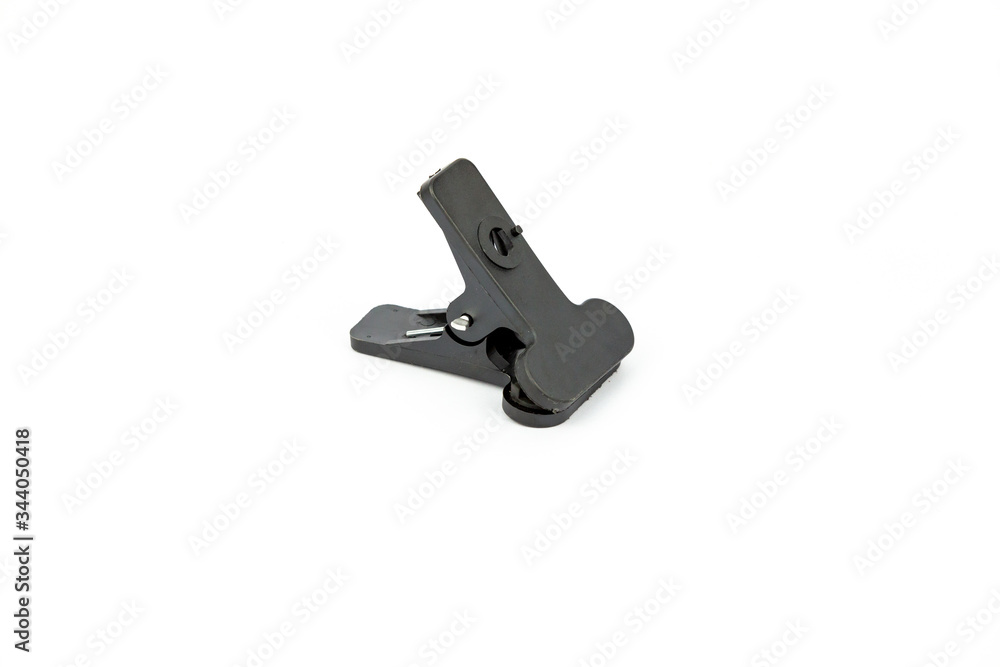 Plastic clip for set background of studio isolated on white background
Plastic clip for set background of studio isolated on white background