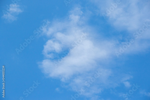 White clouds isolated in a clear cold blue sky on the Highveld of South Africa image for background use