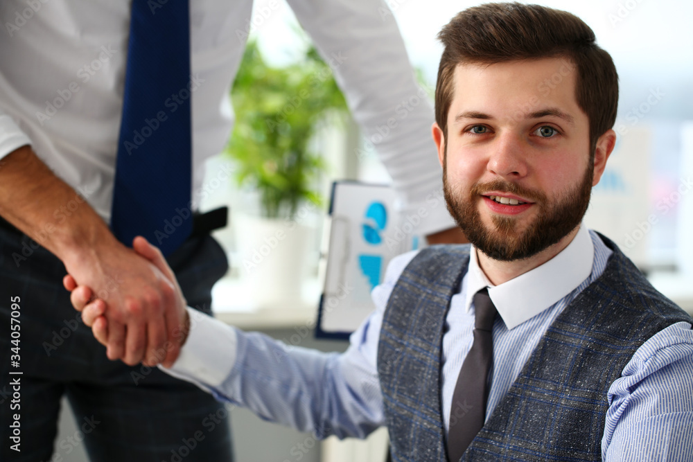 Man in suit and tie give hand as hello in office portrait. Friend welcome mediation offer positive introduction thanks gesture summit participate executive approval motivation male arm strike bargain Man in suit and tie give hand as hello in office portrait. Friend welcome mediation offer positive introduction thanks gesture summit participate executive approval motivation male arm strike bargain