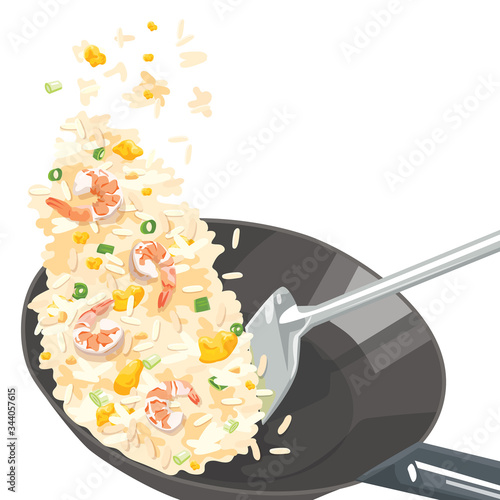 Fried rice with shrimp in frying pan.