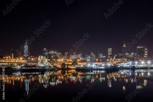 cityscape reflecting on water © Tim