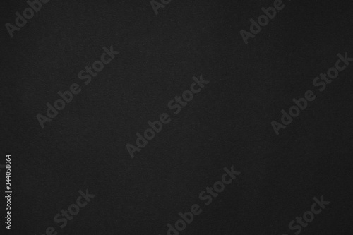 abstract dark background: a large sheet of black paper