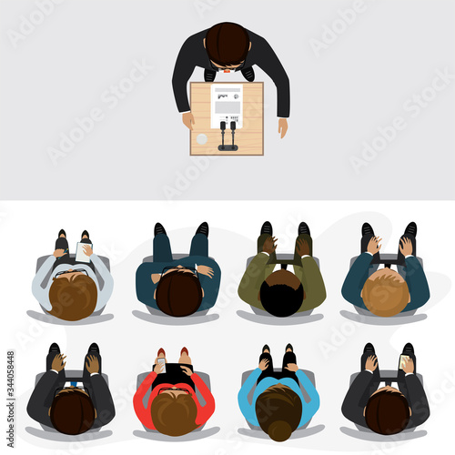 Cartoon businessman or lecturer speaks at a presentation, audience is sitting. Top view, business process.