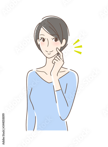 頬をつんつんして笑顔の女性