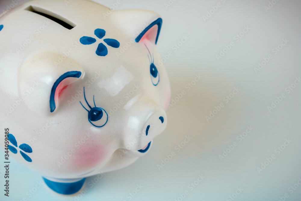 A white piggy bank on a white background with copy space A white piggy bank on a white background with copy space