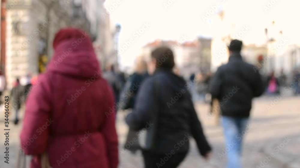 Blurred Background of many people on street square old ancient city town Blurred Background of many people on street square old ancient city town