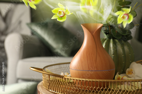Floral oil diffuser on tabl...