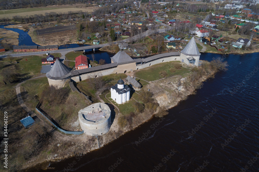 Aerial view of the Staroladozhskaya Fortress on a sunny April day (aerial photography). Staraya Ladoga, Russia