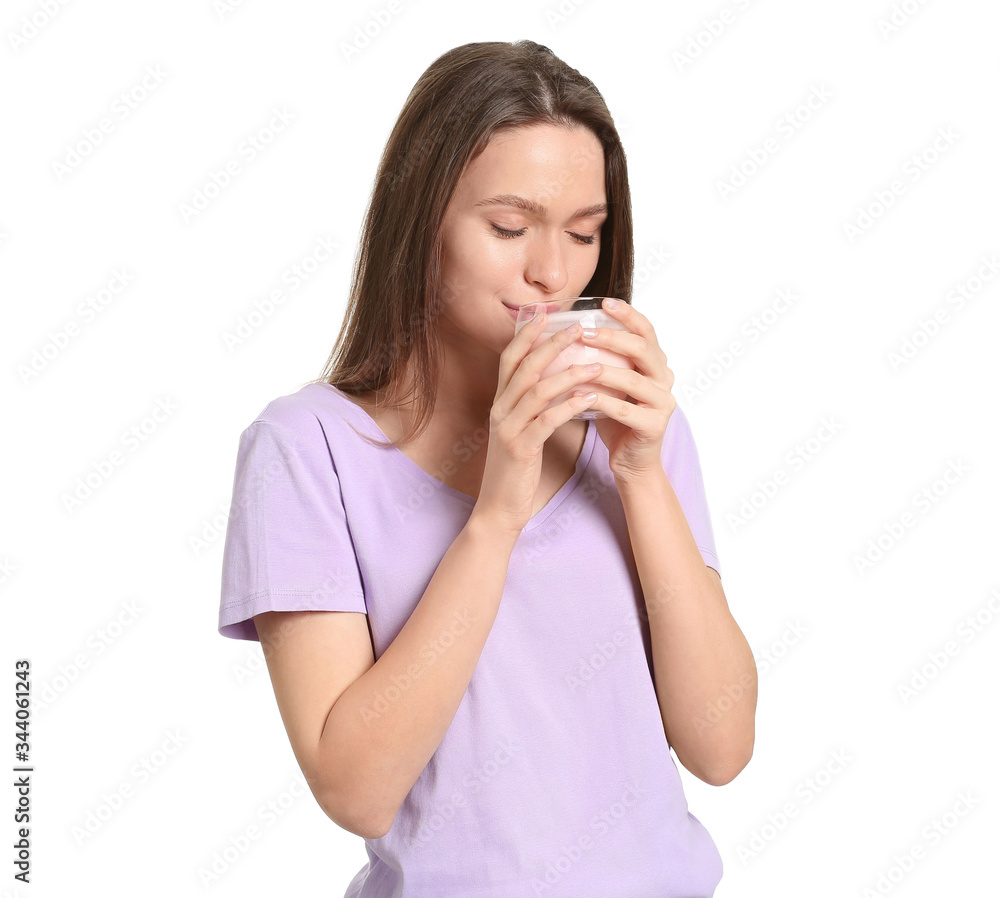 Young woman with tasty yogurt on white background Young woman with tasty yogurt on white background