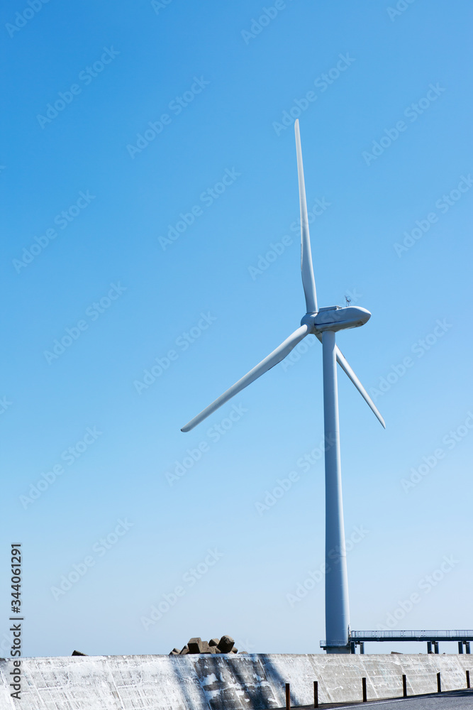 Landscape of wind power plant in blue sky