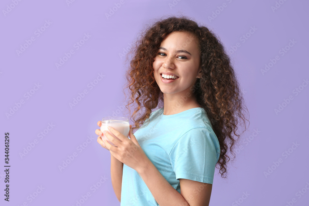 Young woman with tasty yogurt on color background Young woman with tasty yogurt on color background