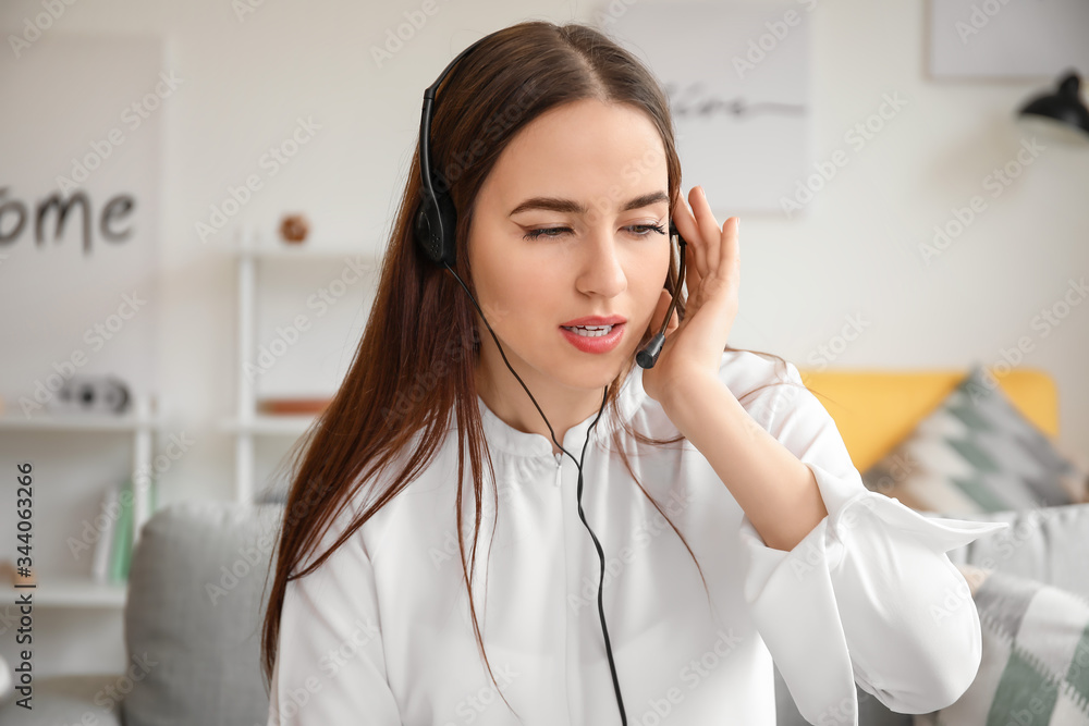 Female technical support agent working at home Female technical support agent working at home