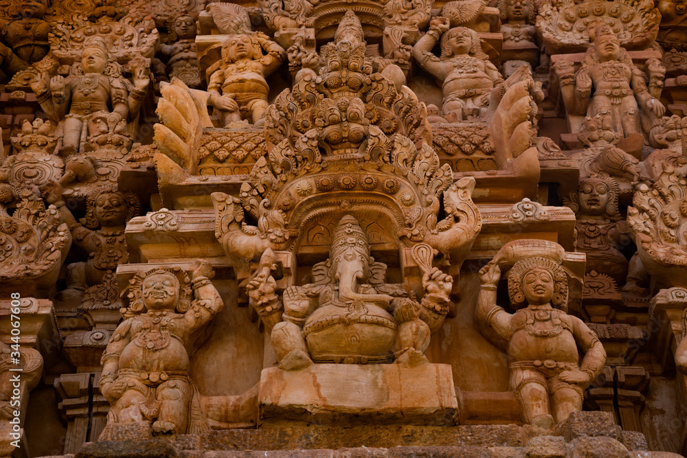 A closeup view of the statues in temple tower of big temple in Tamil Nadu