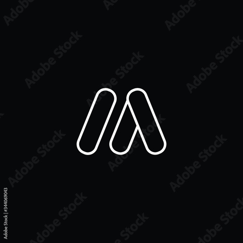Minimal elegant monogram art logo. Outstanding professional trendy awesome artistic M AM MA initial based Alphabet icon logo. Premium Business logo White color on black background