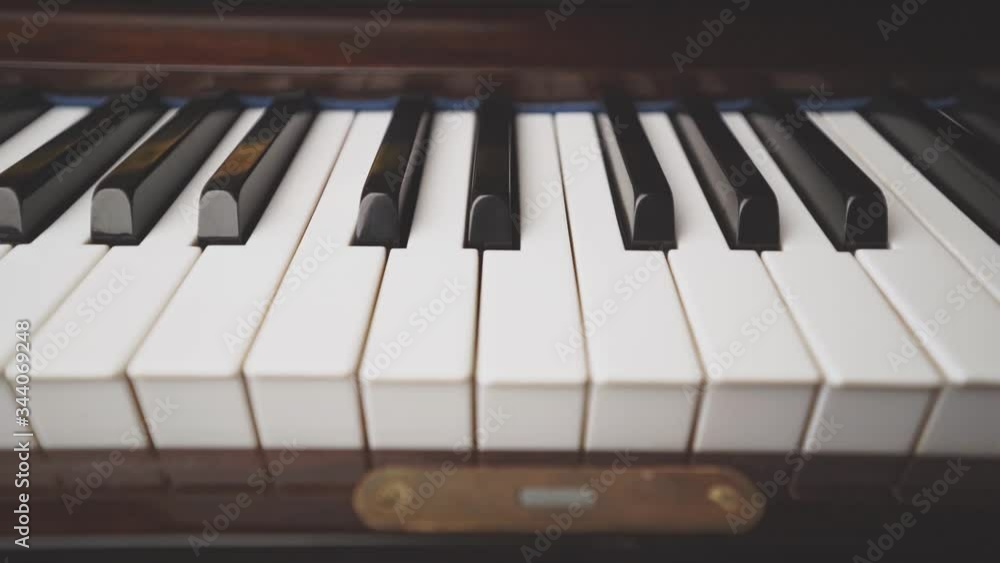 Macro shot zooming out piano keyboard Macro shot zooming out piano keyboard